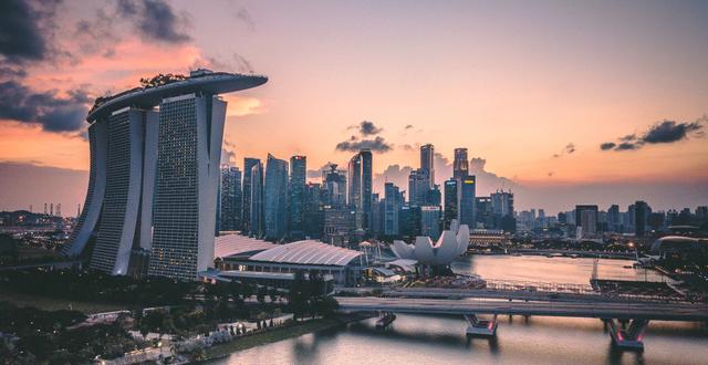 Singapore skyline at sunset with Marina Bay Sands pictured