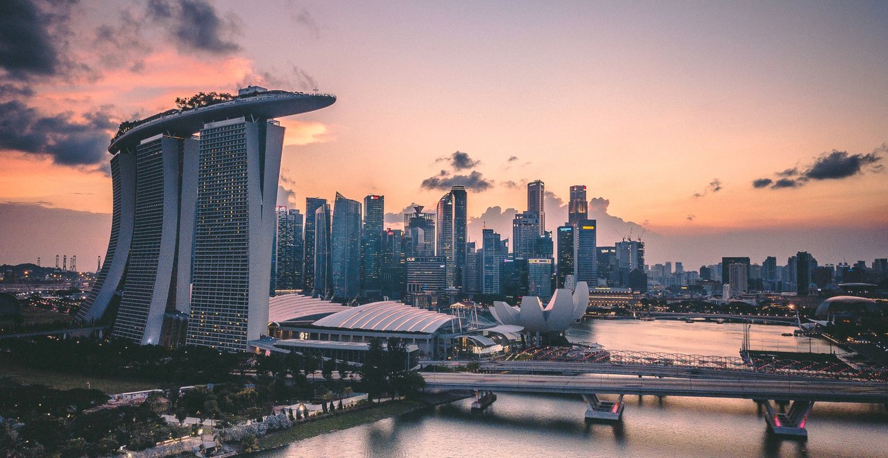 Singapore skyline at sunset with Marina Bay Sands pictured